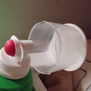 Laundry detergent  cup holder